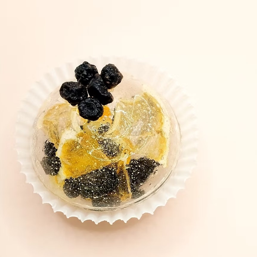 Tea sphere with dried blueberries and lemon inside