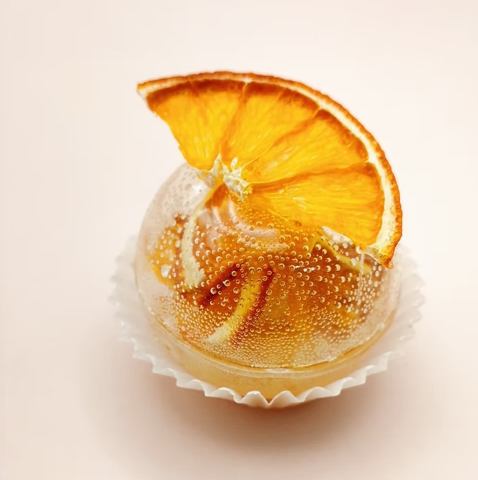 Tea sphere topped with a dried orange slice